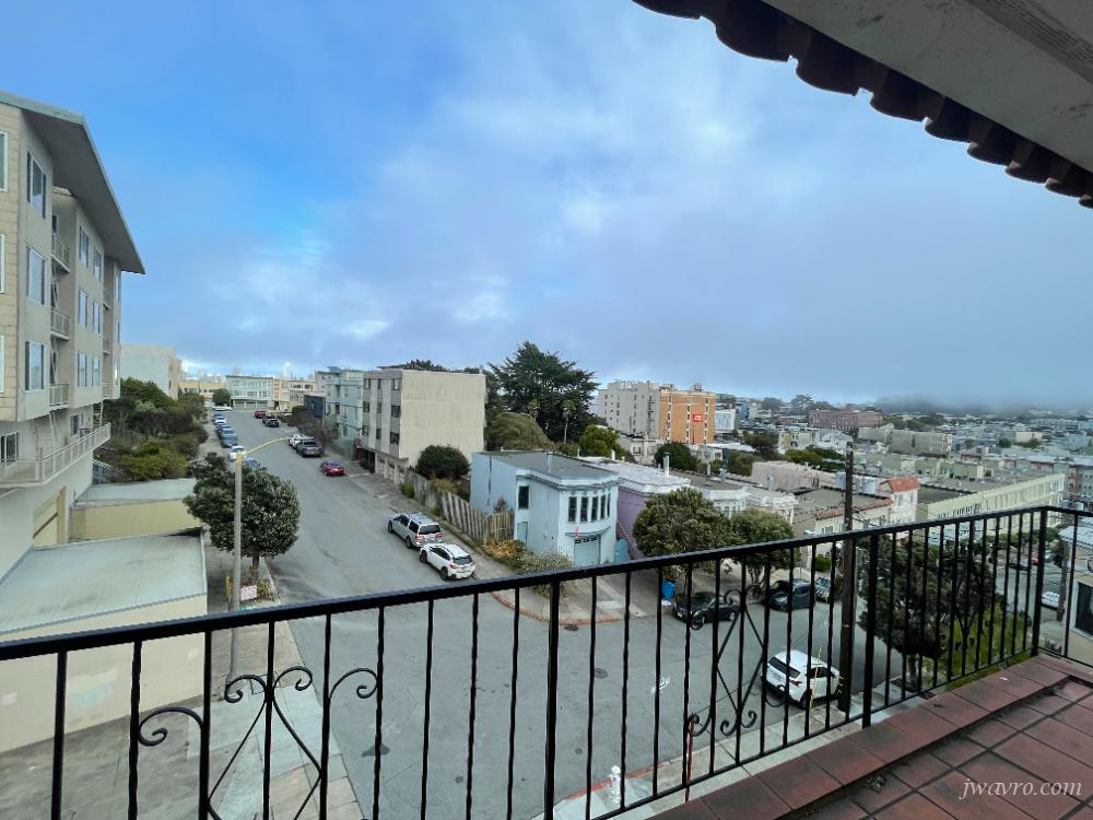 Top floor 2 bedroom apt with private deck, views, parking!