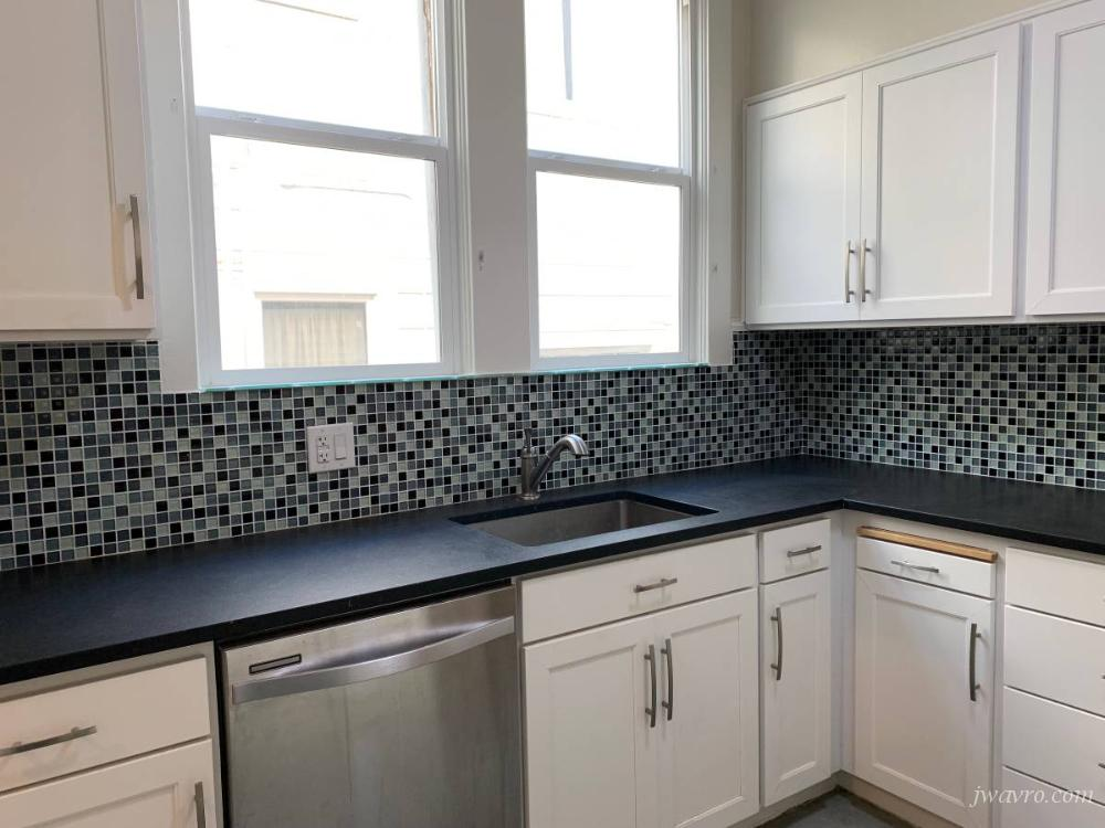 Large 2 bedroom full floor flat + office. Parking included!