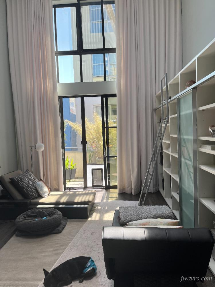 FURNISHED! Custom designed loft. Top floor. City views!