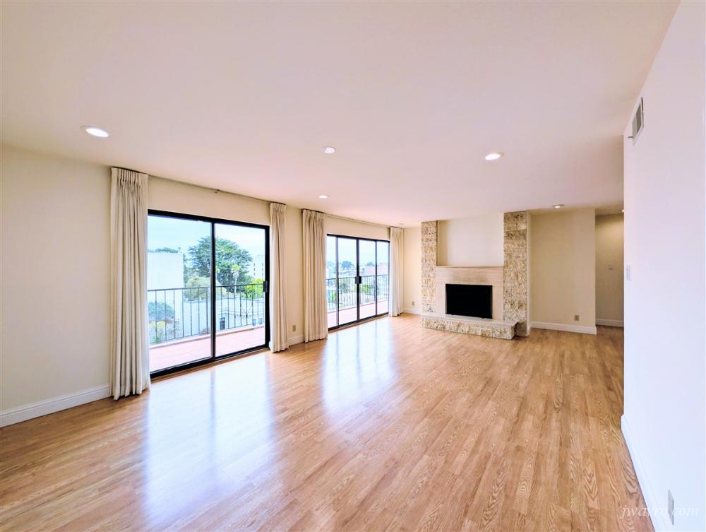 Top floor 2 bedroom apt with private deck, views, parking!